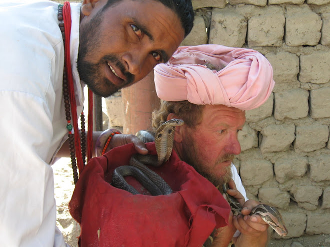 3 snakes and a charmer, who's who?