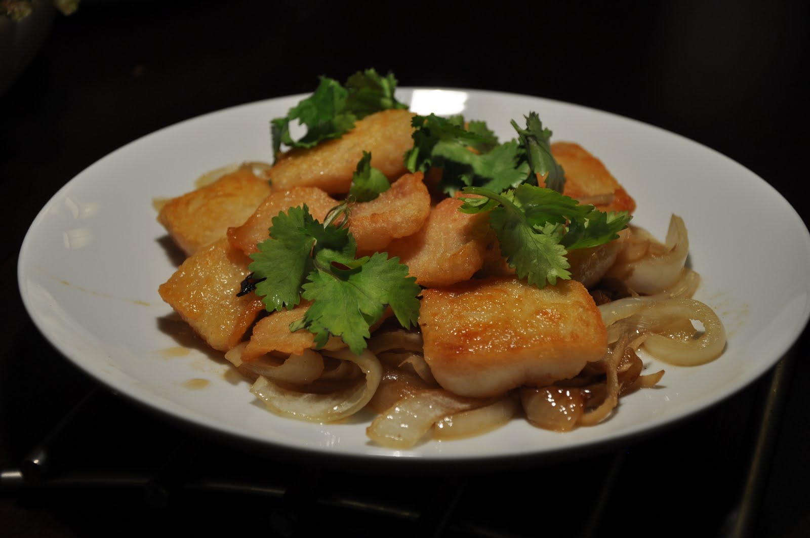 Slice of Rice Crispy Basa (Catfish) with Onions and Ginger