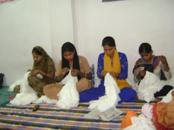 Women in SEWA Delhi sewing beads