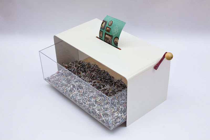 Paper shredding coffee table by Voos Furniture