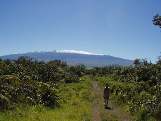 Keoki walking White Rd trail enjoying Mauna Kea viewes