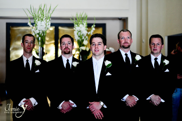 Handsome stylish grooms men waiting in lobby at Mandalay Bay for bride to arrive