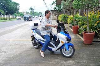 Dave Dewbre on 3000 watt electric motorcycle in Puerto Princesa Palawan. A demo model to show Mayor Ed Hagedorn