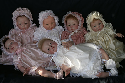 Reborn dolls and custom made smocked clothes by Judith