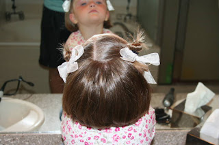 Back view of young girl modeling "Two Messy Twists on Top" Hairstyle
