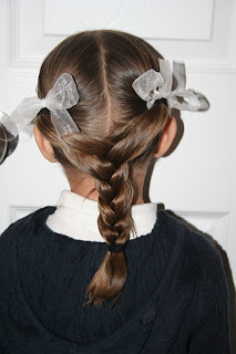 Back view of young girl modeling "Y" braid hairstyle