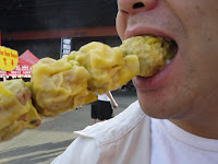 This skewer of siu mai from Pang's made it a long way - to Ms mouth. (Richmond Night Market 2009)