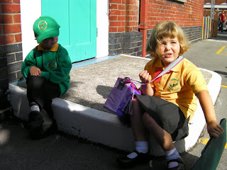 boy and girl in school uniform reception year wimborne infants portsmouth