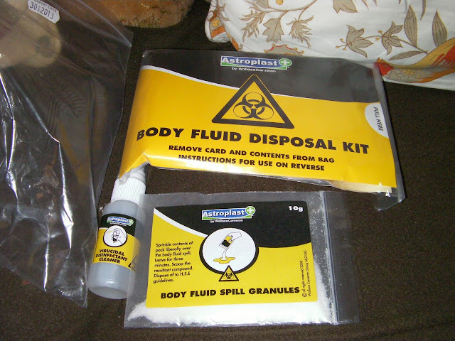 virucidal bodily fluid clean-up kit with spill granules and gloves