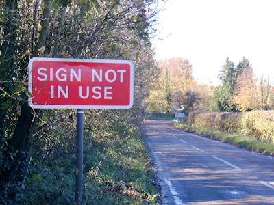 contradictory country signpost - sign not in use, dorset