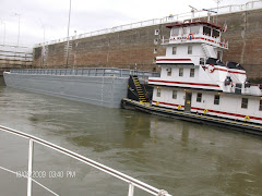 Sharing a lock with a tug and single barge. Many a tow is 3 barges across--or more