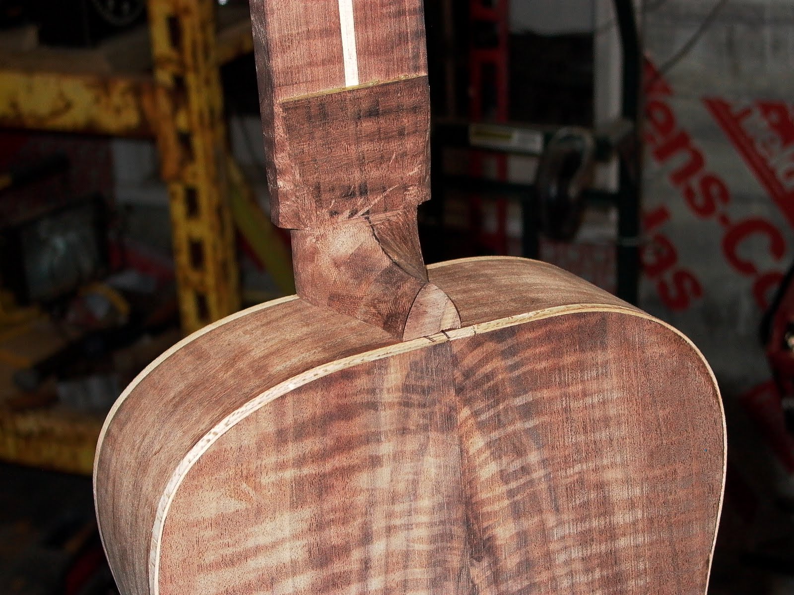 ThreeQuartersLeft Fitting the neck onto an acoustic guitar