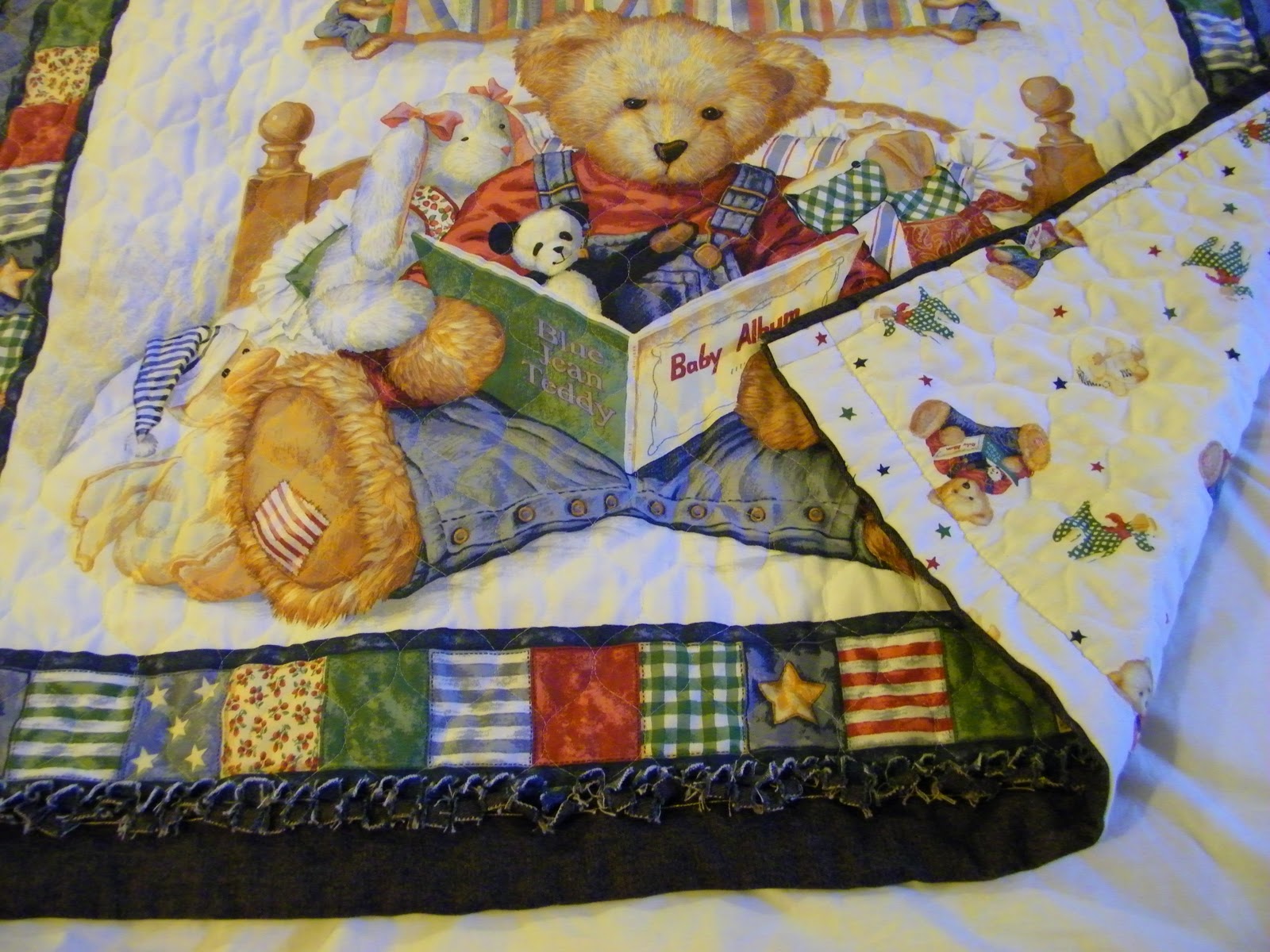 a Paisley Sunflower Blue Jean Teddy baby quilt