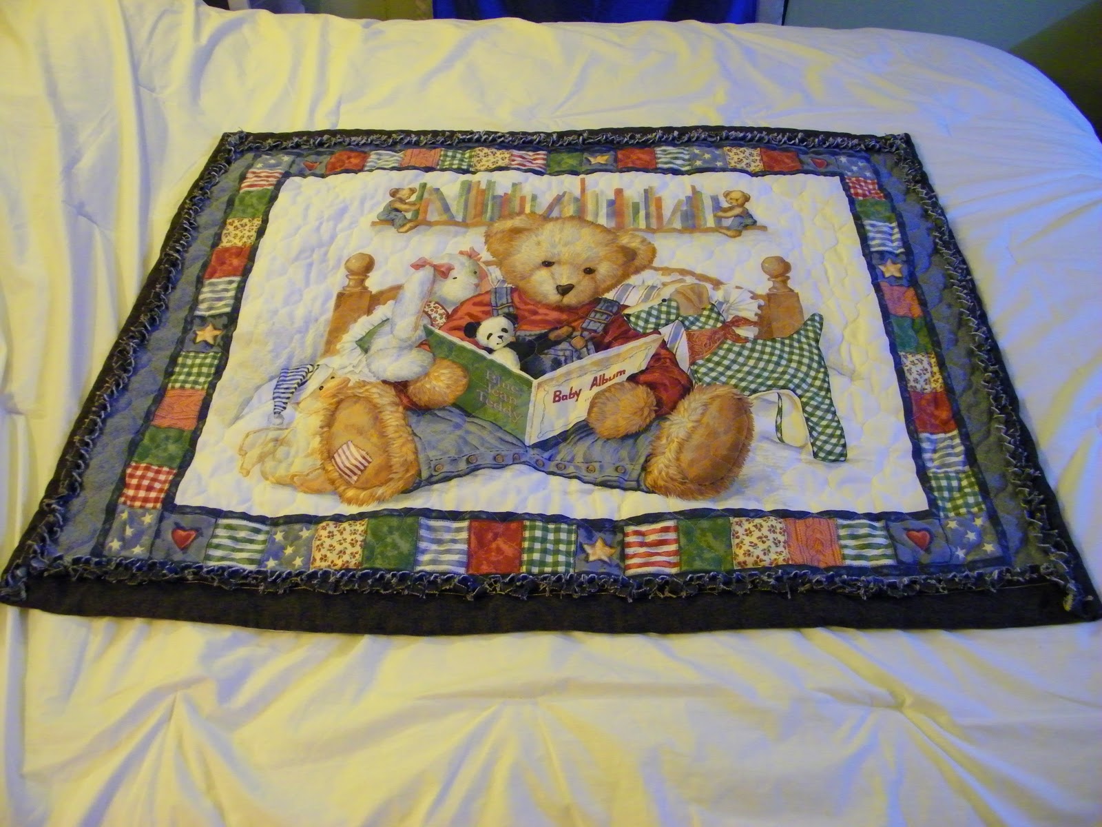 a Paisley Sunflower Blue Jean Teddy baby quilt