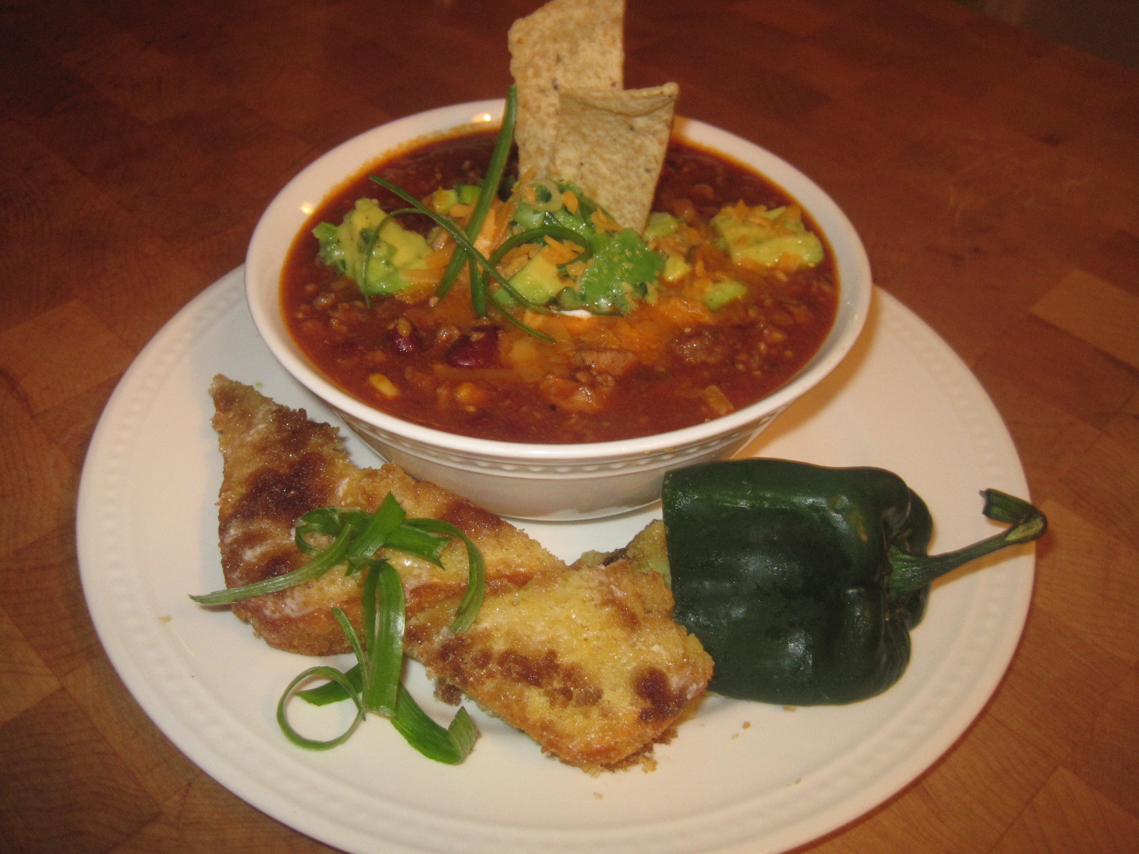 Smoked Tequila Chili with Poblano Avocado Relish and sweet green chili