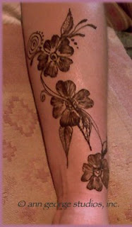 bold arabic flowers henna tattoo