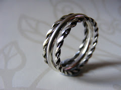 Set Of Three Narrow Silver Rings, One Plain, Two Twisted.