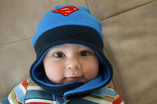 Baby T in his Superman Hat