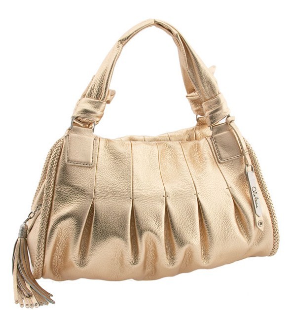 [cole+haan+triple+zip.jpg]