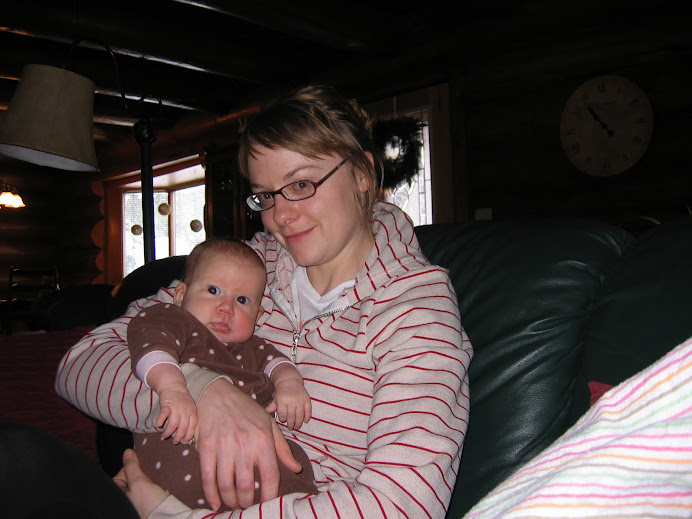 Two little buttons having a snuggle