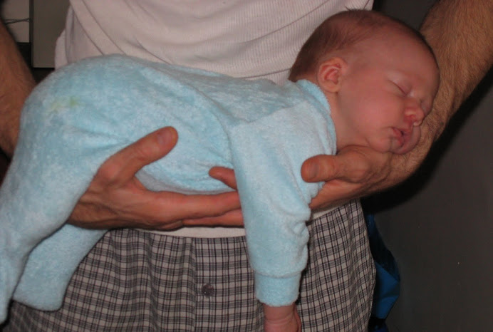 Happiness is a wife beater shirt and a furry arm to sleep on