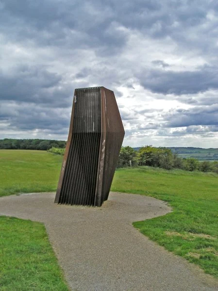 On the left, the meeting point of the Ridgeway and the Icknield Way at the foot if Ivinghoe Beacon; On the right, the Windcatcher, the air intake for the Dunstable Down Visitor Centre heating system