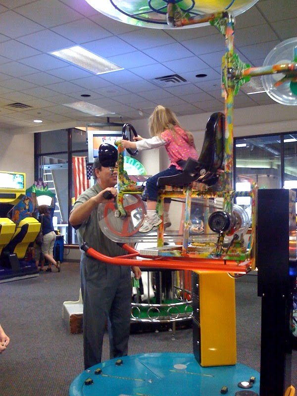 chuck e cheese flying bike