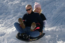 Madi and Mom sledding