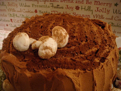 meringue mushrooms atop cake