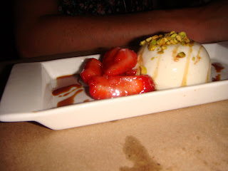 Greek yogurt panna cotta with strawberries and candied pistachios at Ten Tables, Cambridge, Mass.