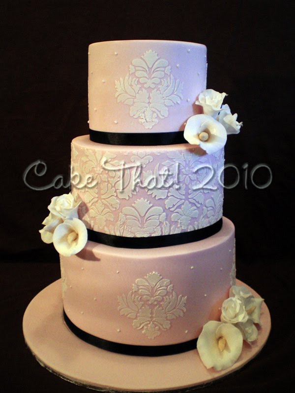 This Bride 39s theme was Pink and Black A pale pink iced Extended height cake