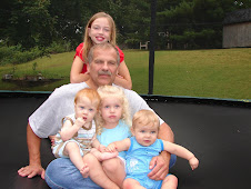 Grandpa with 4 of 5 grandkids.