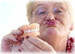 lady+holding+dentures.JPG