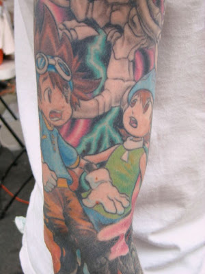 Hands down, best tattoo we saw: complete arm sleeve with Digimon characters.