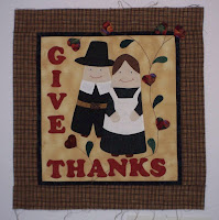 Pilgrim couple and words Give Thanks