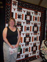 My blogger friend, Pam in front of the Texas Longhorn Quilt she made for her son