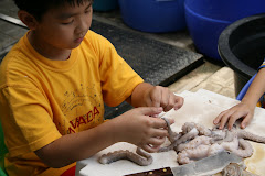 Clay examining a tentacle