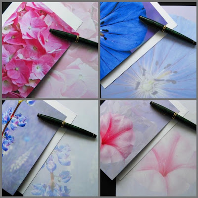 Flower blank greeting card set of four in shades of pink, blue, and lavender.