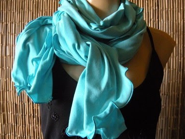 A turquoise neck scarf for summer.