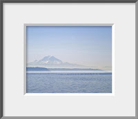 a framed photograph of a misty foggy day at Mount Rainier and Elliott Bay in Seattle