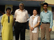 Muneeza, Vibhuti Narain Rai, Lee Koo and Azeem in the library