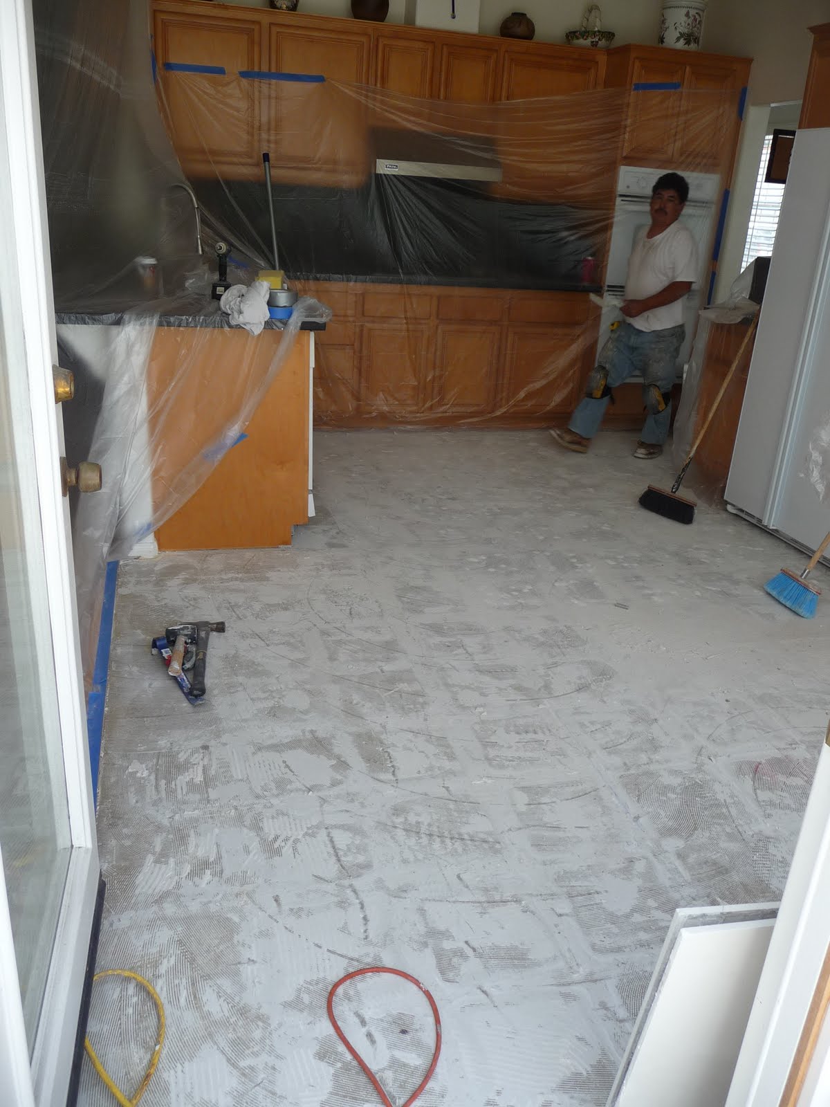 THB Construction Updating old floor tile with 2ft x 2ft Granite Tiles