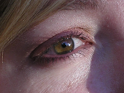 And Liz has amber eyes like a cat's