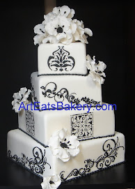 Four tier square black and white wedding cake