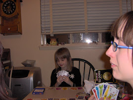 katya playing a card game w/the girls
