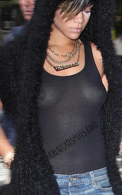 [Image: Rihanna+C-Thru+Shirt+Nipple+Piercing+Pics4.jpg]