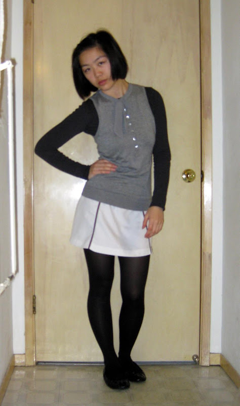 gray tie-neck esprit sweater, white miniskirt