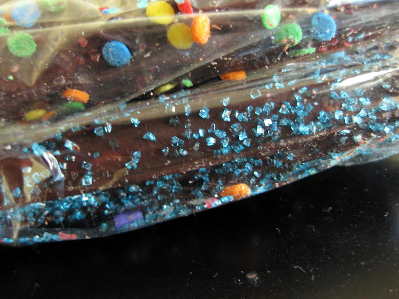 cutest pretzels ever, dipped in chocolate and joyously covered in sprinkles