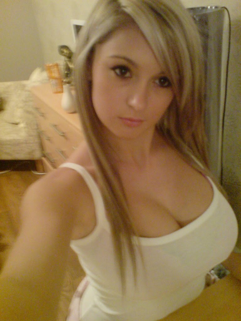 Self Shot Teen Girlfriend Photos Busty Blonde In A White Tanktop