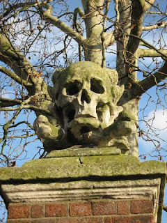 Second skull at the churchyard entrance